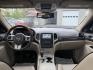 2011 Red /Tan Jeep Grand Cherokee Overland 4WD (1J4RR6GT8BC) with an 5.7L V8 OHV 16V engine, 5-Speed Automatic transmission, located at 547 E. Main St., Orwell, OH, 44076, (440) 437-5893, 41.535435, -80.847855 - This 2011 Jeep Grand Cherokee Overland 4WD comes equipped with a powerful 5.7L HEMI V8 engine and a 5-speed automatic transmission, offering robust performance and a substantial 7,200-pound towing capacity. Its luxury-oriented interior features leather seating, heated and cooled front seats, a 6.5-i - Photo#30