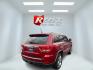2011 Red /Tan Jeep Grand Cherokee Overland 4WD (1J4RR6GT8BC) with an 5.7L V8 OHV 16V engine, 5-Speed Automatic transmission, located at 547 E. Main St., Orwell, OH, 44076, (440) 437-5893, 41.535435, -80.847855 - This 2011 Jeep Grand Cherokee Overland 4WD comes equipped with a powerful 5.7L HEMI V8 engine and a 5-speed automatic transmission, offering robust performance and a substantial 7,200-pound towing capacity. Its luxury-oriented interior features leather seating, heated and cooled front seats, a 6.5-i - Photo#13