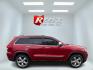2011 Red /Tan Jeep Grand Cherokee Overland 4WD (1J4RR6GT8BC) with an 5.7L V8 OHV 16V engine, 5-Speed Automatic transmission, located at 547 E. Main St., Orwell, OH, 44076, (440) 437-5893, 41.535435, -80.847855 - This 2011 Jeep Grand Cherokee Overland 4WD comes equipped with a powerful 5.7L HEMI V8 engine and a 5-speed automatic transmission, offering robust performance and a substantial 7,200-pound towing capacity. Its luxury-oriented interior features leather seating, heated and cooled front seats, a 6.5-i - Photo#12
