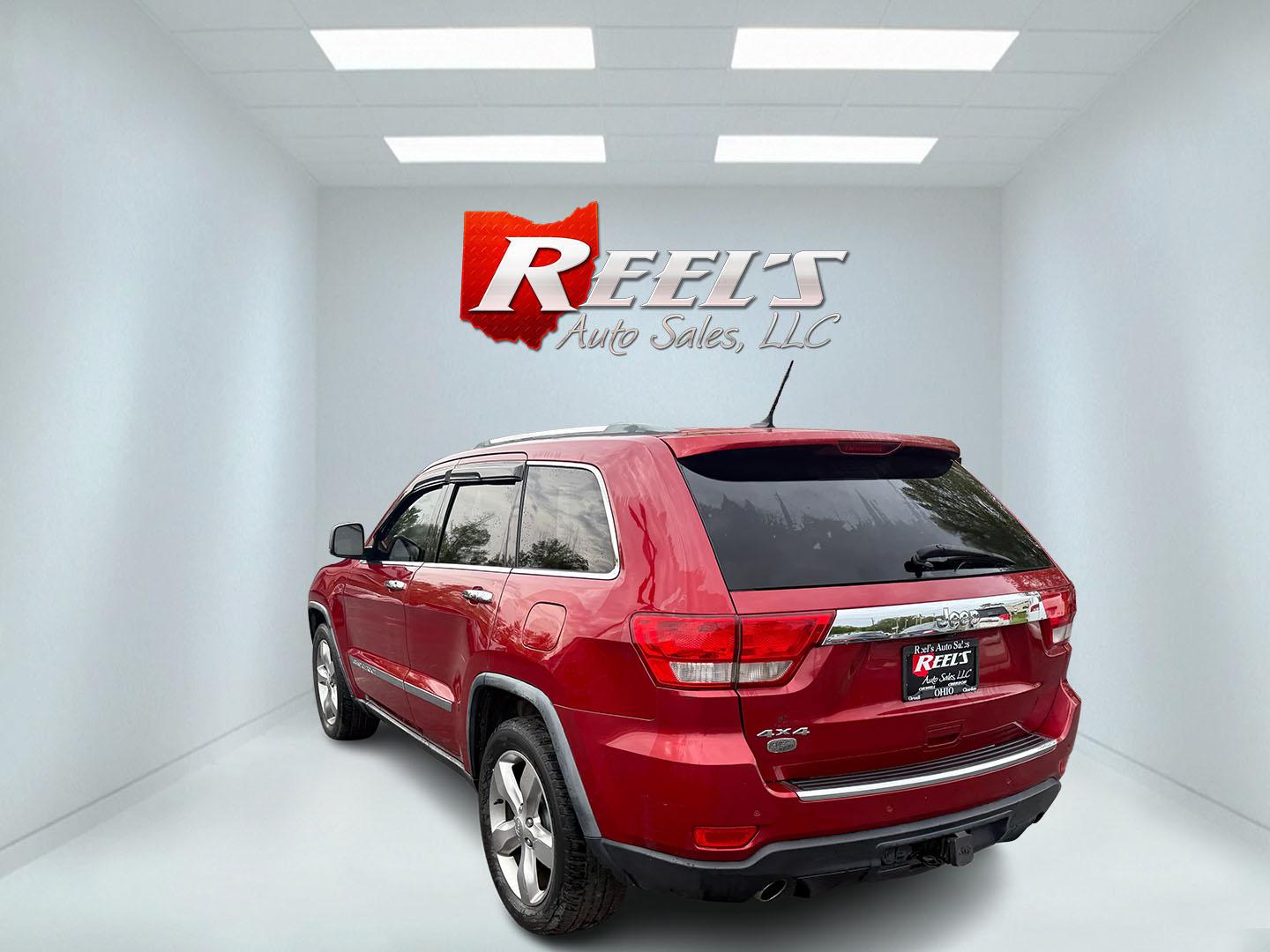 2011 Red /Tan Jeep Grand Cherokee Overland 4WD (1J4RR6GT8BC) with an 5.7L V8 OHV 16V engine, 5-Speed Automatic transmission, located at 547 E. Main St., Orwell, OH, 44076, (440) 437-5893, 41.535435, -80.847855 - This 2011 Jeep Grand Cherokee Overland 4WD comes equipped with a powerful 5.7L HEMI V8 engine and a 5-speed automatic transmission, offering robust performance and a substantial 7,200-pound towing capacity. Its luxury-oriented interior features leather seating, heated and cooled front seats, a 6.5-i - Photo#41