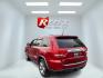 2011 Red /Tan Jeep Grand Cherokee Overland 4WD (1J4RR6GT8BC) with an 5.7L V8 OHV 16V engine, 5-Speed Automatic transmission, located at 547 E. Main St., Orwell, OH, 44076, (440) 437-5893, 41.535435, -80.847855 - This 2011 Jeep Grand Cherokee Overland 4WD comes equipped with a powerful 5.7L HEMI V8 engine and a 5-speed automatic transmission, offering robust performance and a substantial 7,200-pound towing capacity. Its luxury-oriented interior features leather seating, heated and cooled front seats, a 6.5-i - Photo#41