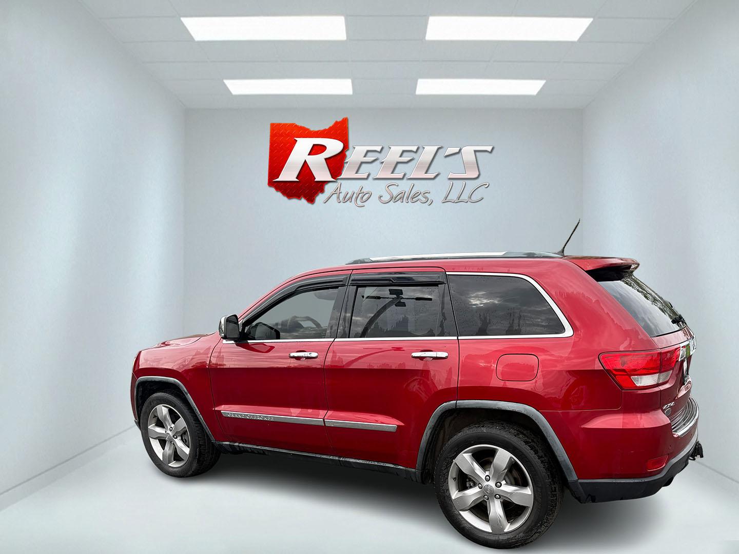 2011 Red /Tan Jeep Grand Cherokee Overland 4WD (1J4RR6GT8BC) with an 5.7L V8 OHV 16V engine, 5-Speed Automatic transmission, located at 547 E. Main St., Orwell, OH, 44076, (440) 437-5893, 41.535435, -80.847855 - This 2011 Jeep Grand Cherokee Overland 4WD comes equipped with a powerful 5.7L HEMI V8 engine and a 5-speed automatic transmission, offering robust performance and a substantial 7,200-pound towing capacity. Its luxury-oriented interior features leather seating, heated and cooled front seats, a 6.5-i - Photo#42