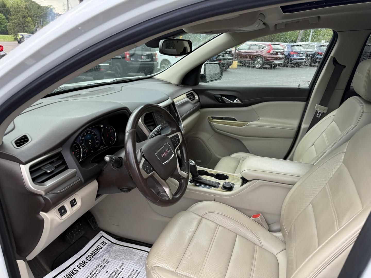 2019 White /Gray GMC Acadia Denali AWD (1GKKNXLS9KZ) with an 3.6L V6 DOHC 24V engine, 6A transmission, located at 11115 Chardon Rd. , Chardon, OH, 44024, (440) 214-9705, 41.580246, -81.241943 - This 2019 GMC Acadia Denali AWD is GMC's pinocle of midsize SUV's. Featuring a 3.6L V6 engine, luxurious leather interior, and advanced comfort with heated and cooled front seats, plus heated second-row captain’s chairs. It offers tri-zone automatic climate control, an 8-inch touchscreen with navi - Photo#14