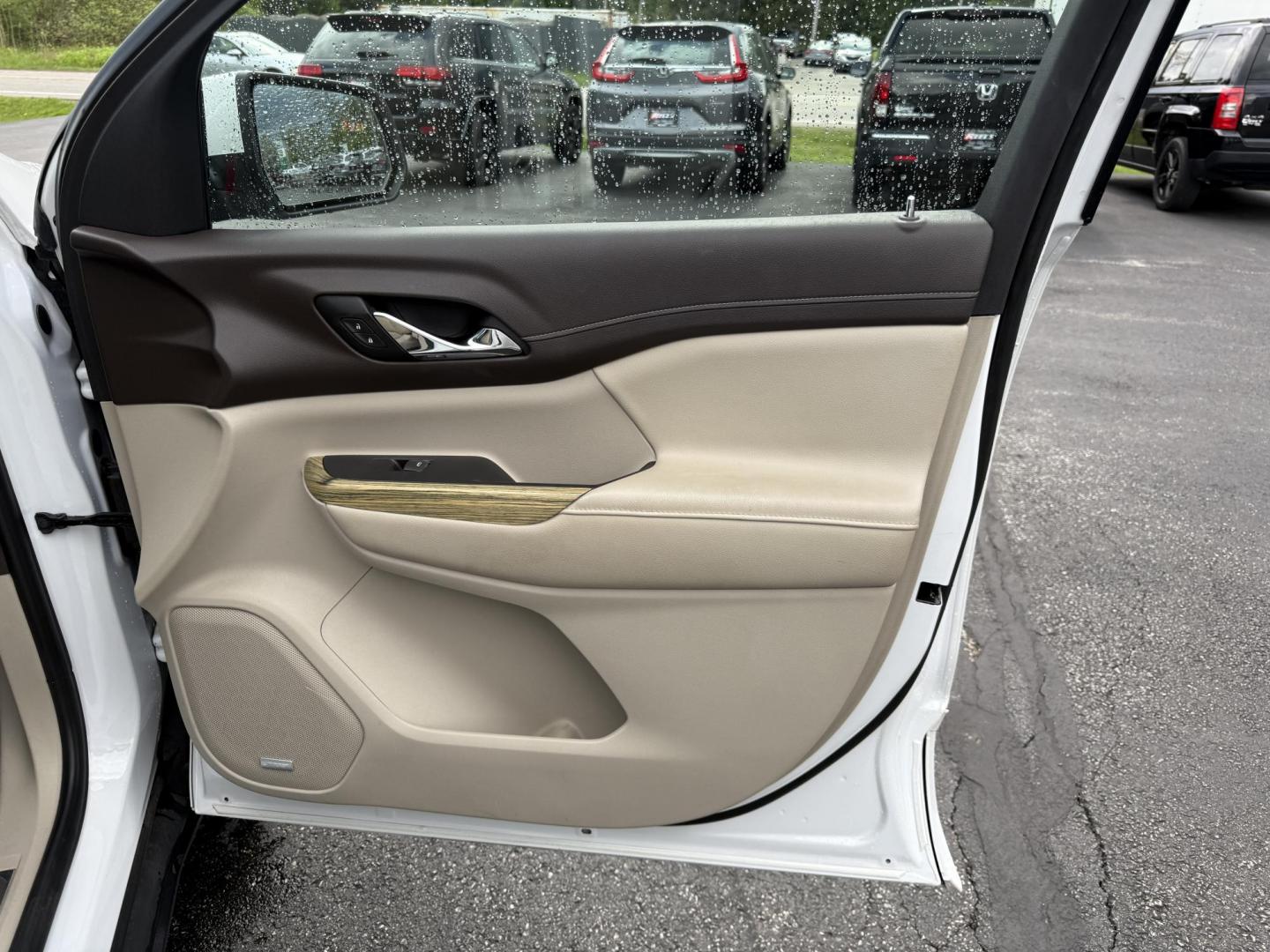 2019 White /Gray GMC Acadia Denali AWD (1GKKNXLS9KZ) with an 3.6L V6 DOHC 24V engine, 6A transmission, located at 11115 Chardon Rd. , Chardon, OH, 44024, (440) 214-9705, 41.580246, -81.241943 - This 2019 GMC Acadia Denali AWD is GMC's pinocle of midsize SUV's. Featuring a 3.6L V6 engine, luxurious leather interior, and advanced comfort with heated and cooled front seats, plus heated second-row captain’s chairs. It offers tri-zone automatic climate control, an 8-inch touchscreen with navi - Photo#4
