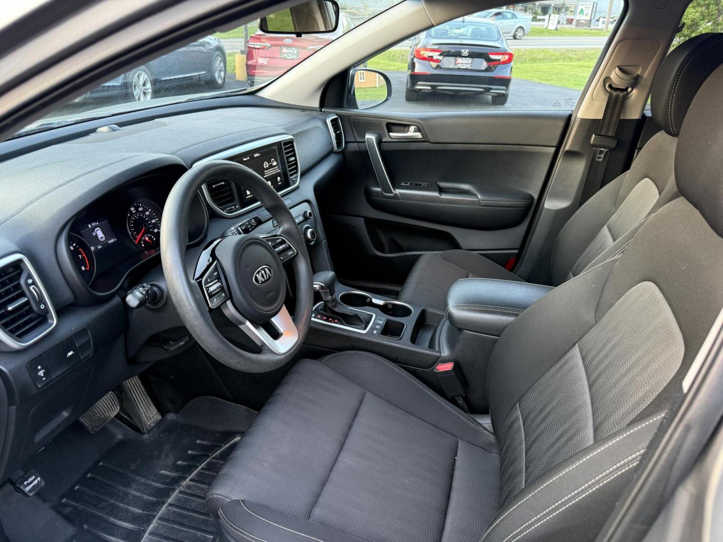 2020 Gray /Black Kia Sportage LX AWD (KNDPMCAC8L7) with an 2.4L I4 DOHC 16V engine, 6A transmission, located at 11115 Chardon Rd. , Chardon, OH, 44024, (440) 214-9705, 41.580246, -81.241943 - Photo#4