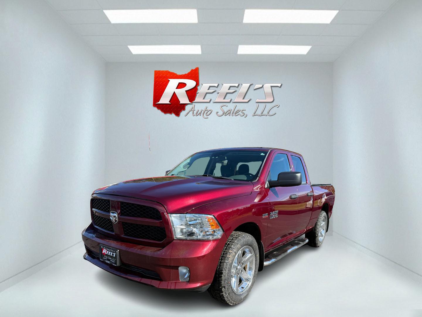 2018 Red /Gray RAM 1500 Express Quad Cab 4WD (1C6RR7FT6JS) with an 5.7L V8 OHV 16V engine, 8A transmission, located at 11115 Chardon Rd. , Chardon, OH, 44024, (440) 214-9705, 41.580246, -81.241943 - Unleash the HEMI Power – 2018 Ram 1500 Express Quad Cab, Ready for Work or Play! Get the perfect blend of power and practicality with this 2018 Ram 1500 Express Quad Cab. Under the hood, a legendary 5.7L HEMI V8 engine pairs with an 8-speed automatic transmission, delivering 395 horsepower, 410 l - Photo#0