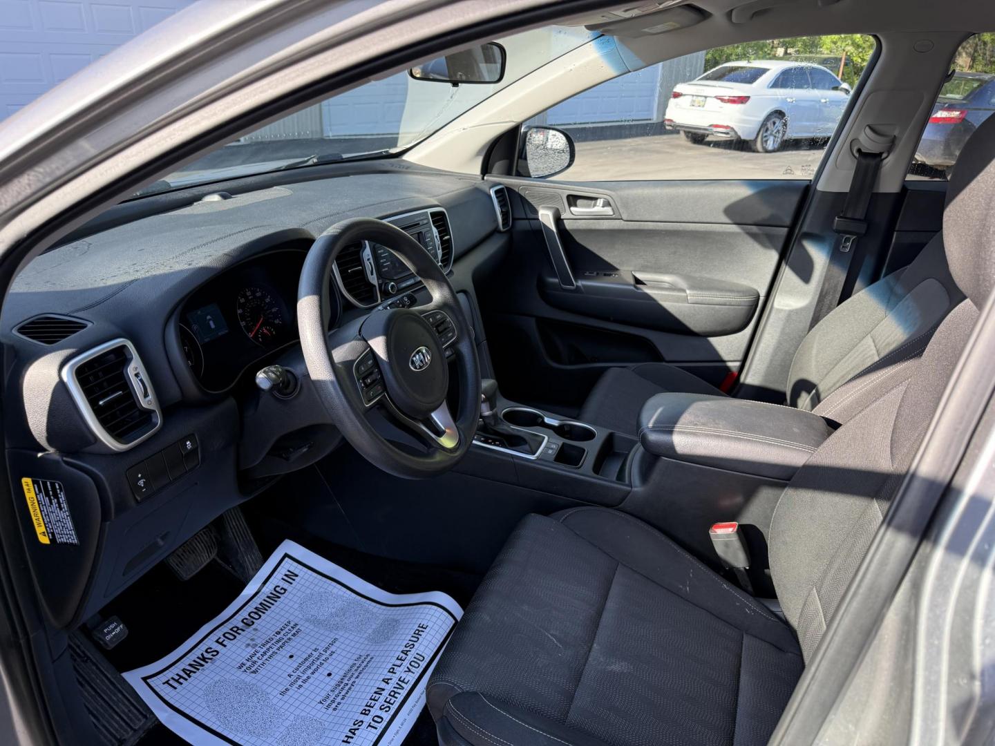 2019 Silver /Black Kia Sportage LX FWD (KNDPM3AC9K7) with an 2.4L I4 DOHC 16V engine, 6A transmission, located at 547 E. Main St., Orwell, OH, 44076, (440) 437-5893, 41.535435, -80.847855 - FRESH TRADE ALERT ---- This 2019 Kia Sportage LX FWD features a 2.4L I4 GDI engine paired with a 6-speed automatic transmission, offering an EPA-estimated 30 MPG on the highway. Notable features include LED daytime running lights, dusk-sensing headlights, a backup camera, and a 5.0" touchscreen info - Photo#4