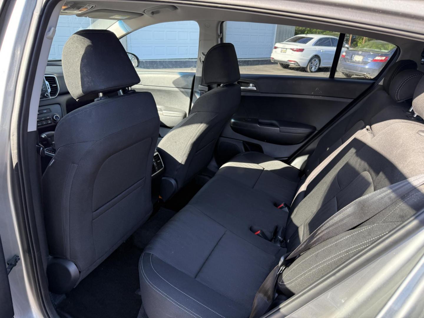 2019 Silver /Black Kia Sportage LX FWD (KNDPM3AC9K7) with an 2.4L I4 DOHC 16V engine, 6A transmission, located at 547 E. Main St., Orwell, OH, 44076, (440) 437-5893, 41.535435, -80.847855 - FRESH TRADE ALERT ---- This 2019 Kia Sportage LX FWD features a 2.4L I4 GDI engine paired with a 6-speed automatic transmission, offering an EPA-estimated 30 MPG on the highway. Notable features include LED daytime running lights, dusk-sensing headlights, a backup camera, and a 5.0" touchscreen info - Photo#24