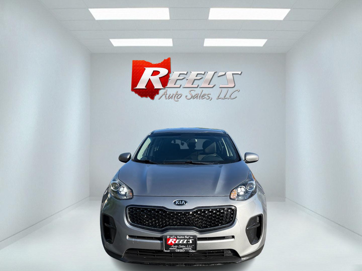 2019 Silver /Black Kia Sportage LX FWD (KNDPM3AC9K7) with an 2.4L I4 DOHC 16V engine, 6A transmission, located at 547 E. Main St., Orwell, OH, 44076, (440) 437-5893, 41.535435, -80.847855 - FRESH TRADE ALERT ---- This 2019 Kia Sportage LX FWD features a 2.4L I4 GDI engine paired with a 6-speed automatic transmission, offering an EPA-estimated 30 MPG on the highway. Notable features include LED daytime running lights, dusk-sensing headlights, a backup camera, and a 5.0" touchscreen info - Photo#1