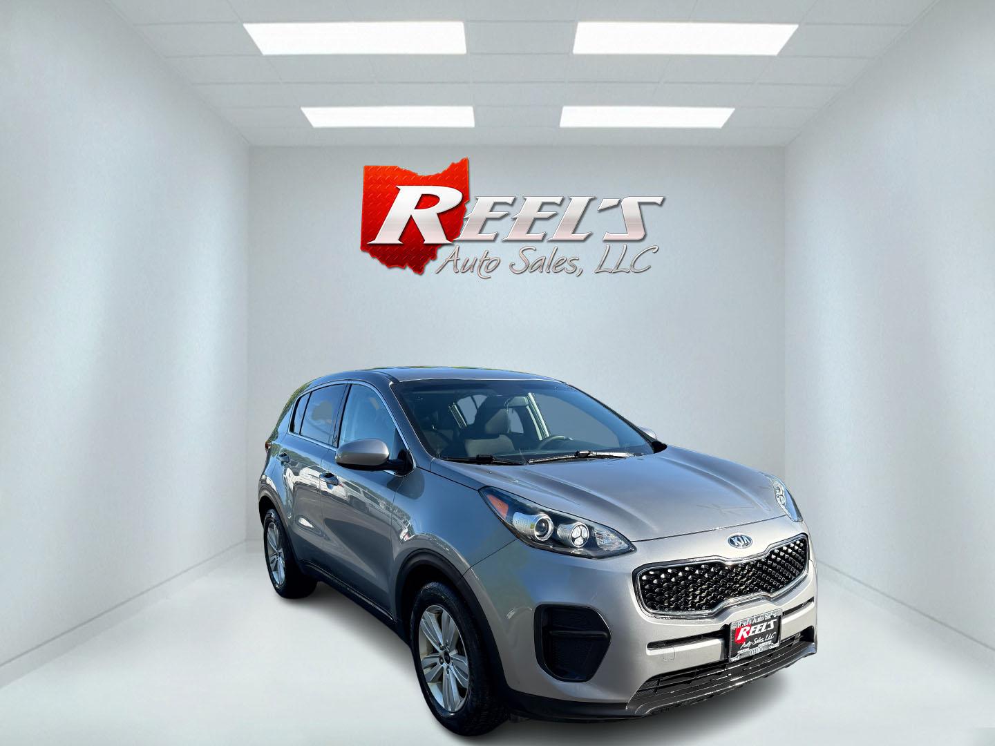 2019 Silver /Black Kia Sportage LX FWD (KNDPM3AC9K7) with an 2.4L I4 DOHC 16V engine, 6A transmission, located at 547 E. Main St., Orwell, OH, 44076, (440) 437-5893, 41.535435, -80.847855 - FRESH TRADE ALERT ---- This 2019 Kia Sportage LX FWD features a 2.4L I4 GDI engine paired with a 6-speed automatic transmission, offering an EPA-estimated 30 MPG on the highway. Notable features include LED daytime running lights, dusk-sensing headlights, a backup camera, and a 5.0" touchscreen info - Photo#2