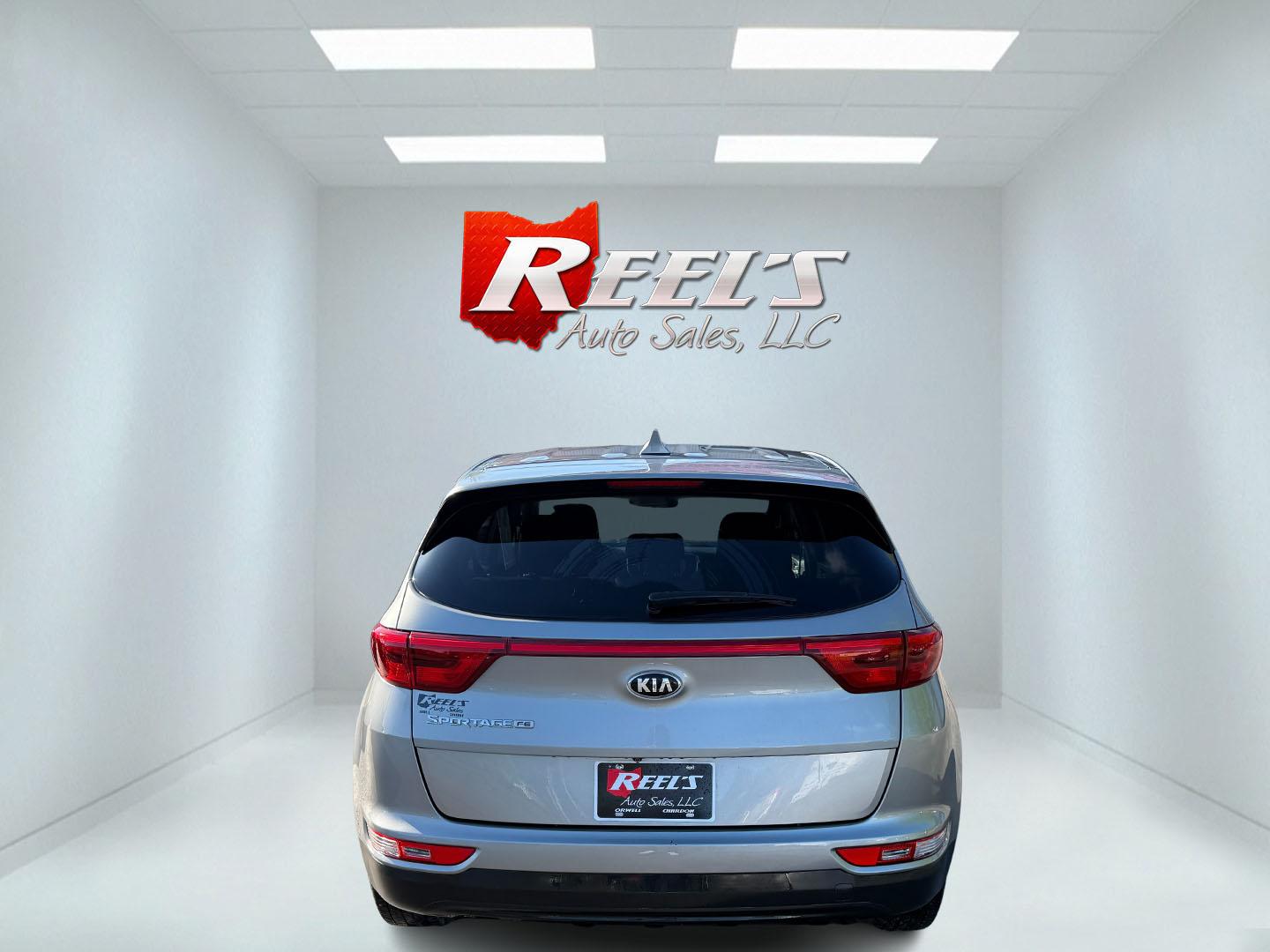 2019 Silver /Black Kia Sportage LX FWD (KNDPM3AC9K7) with an 2.4L I4 DOHC 16V engine, 6A transmission, located at 547 E. Main St., Orwell, OH, 44076, (440) 437-5893, 41.535435, -80.847855 - FRESH TRADE ALERT ---- This 2019 Kia Sportage LX FWD features a 2.4L I4 GDI engine paired with a 6-speed automatic transmission, offering an EPA-estimated 30 MPG on the highway. Notable features include LED daytime running lights, dusk-sensing headlights, a backup camera, and a 5.0" touchscreen info - Photo#36
