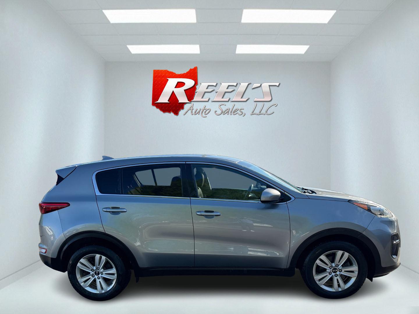 2019 Silver /Black Kia Sportage LX FWD (KNDPM3AC9K7) with an 2.4L I4 DOHC 16V engine, 6A transmission, located at 547 E. Main St., Orwell, OH, 44076, (440) 437-5893, 41.535435, -80.847855 - FRESH TRADE ALERT ---- This 2019 Kia Sportage LX FWD features a 2.4L I4 GDI engine paired with a 6-speed automatic transmission, offering an EPA-estimated 30 MPG on the highway. Notable features include LED daytime running lights, dusk-sensing headlights, a backup camera, and a 5.0" touchscreen info - Photo#13