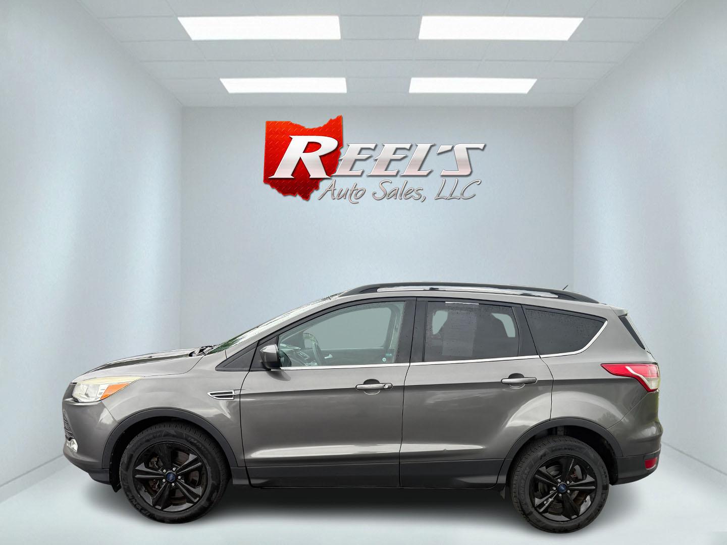 2014 Gray /Black Ford Escape SE 4WD (1FMCU9GX8EU) with an 1.6L I4 DOHC 16V TURBO engine, 6-Speed Automatic transmission, located at 11115 Chardon Rd. , Chardon, OH, 44024, (440) 214-9705, 41.580246, -81.241943 - Photo#35