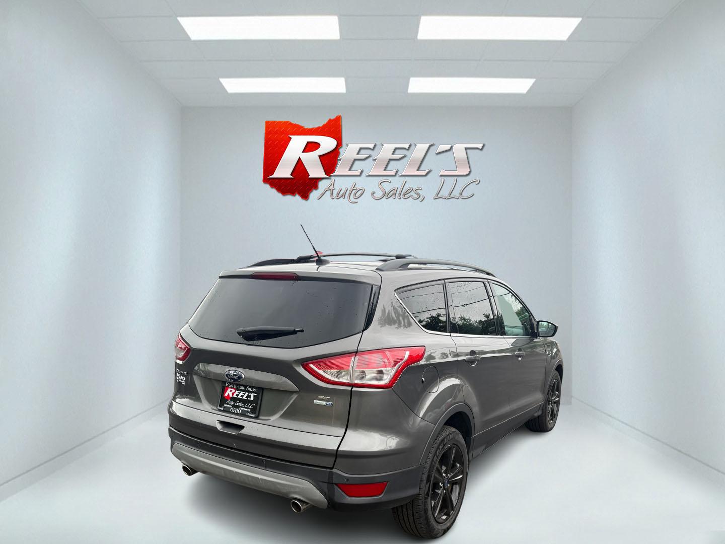 2014 Gray /Black Ford Escape SE 4WD (1FMCU9GX8EU) with an 1.6L I4 DOHC 16V TURBO engine, 6-Speed Automatic transmission, located at 11115 Chardon Rd. , Chardon, OH, 44024, (440) 214-9705, 41.580246, -81.241943 - Photo#13