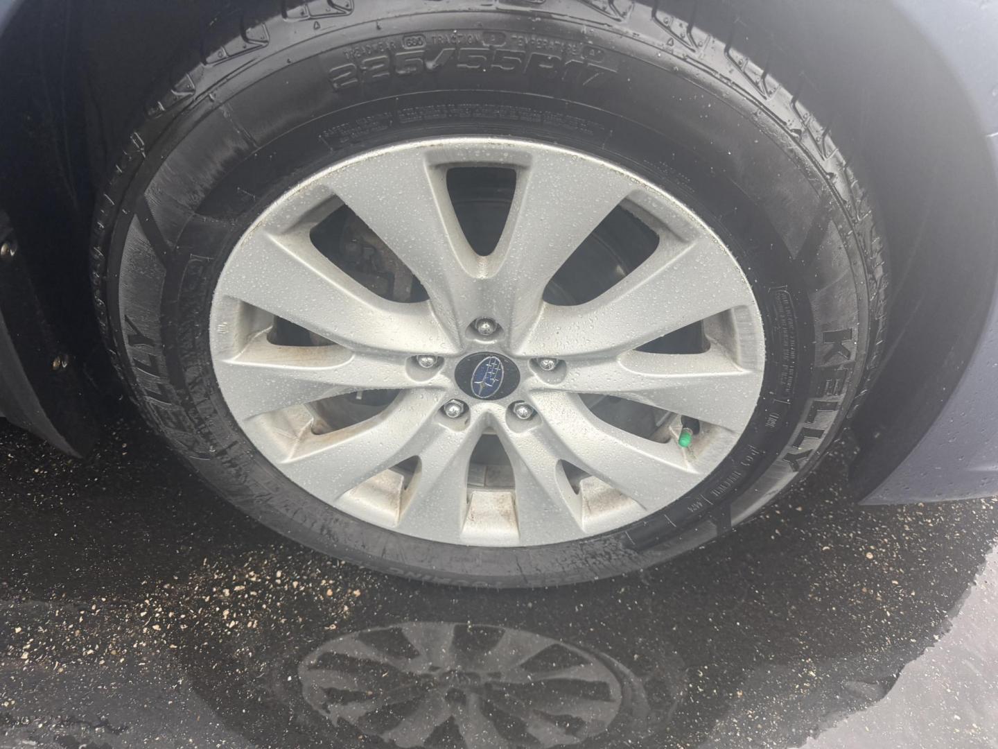 2015 Blue /Tan Subaru Legacy 2.5i Premium (4S3BNAC69F3) with an 2.5L H4 DOHC 16V engine, Automatic transmission, located at 11115 Chardon Rd. , Chardon, OH, 44024, (440) 214-9705, 41.580246, -81.241943 - This 2015 Subaru Legacy 2.5i Premium is equipped with a 2.5L H4 engine and Subaru's renowned Symmetrical All-Wheel Drive, delivering excellent traction and up to 35 MPG highway. This midsize sedan offers comfort and convenience with dual-zone automatic climate control, heated front seats, a power dr - Photo#4