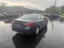2015 Blue /Tan Subaru Legacy 2.5i Premium (4S3BNAC69F3) with an 2.5L H4 DOHC 16V engine, Automatic transmission, located at 11115 Chardon Rd. , Chardon, OH, 44024, (440) 214-9705, 41.580246, -81.241943 - This 2015 Subaru Legacy 2.5i Premium is equipped with a 2.5L H4 engine and Subaru's renowned Symmetrical All-Wheel Drive, delivering excellent traction and up to 35 MPG highway. This midsize sedan offers comfort and convenience with dual-zone automatic climate control, heated front seats, a power dr - Photo#7