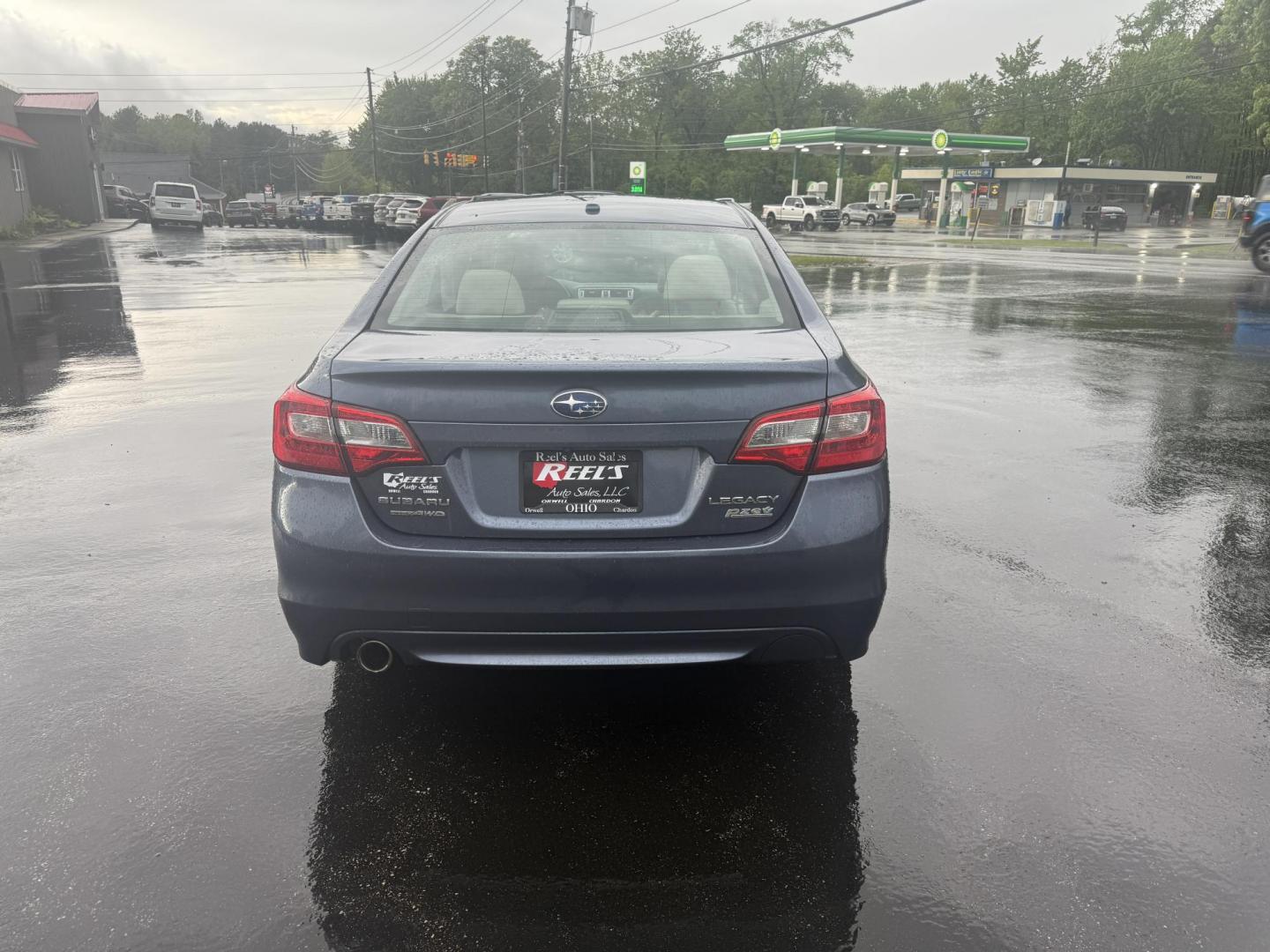 2015 Blue /Tan Subaru Legacy 2.5i Premium (4S3BNAC69F3) with an 2.5L H4 DOHC 16V engine, Automatic transmission, located at 11115 Chardon Rd. , Chardon, OH, 44024, (440) 214-9705, 41.580246, -81.241943 - This 2015 Subaru Legacy 2.5i Premium is equipped with a 2.5L H4 engine and Subaru's renowned Symmetrical All-Wheel Drive, delivering excellent traction and up to 35 MPG highway. This midsize sedan offers comfort and convenience with dual-zone automatic climate control, heated front seats, a power dr - Photo#8