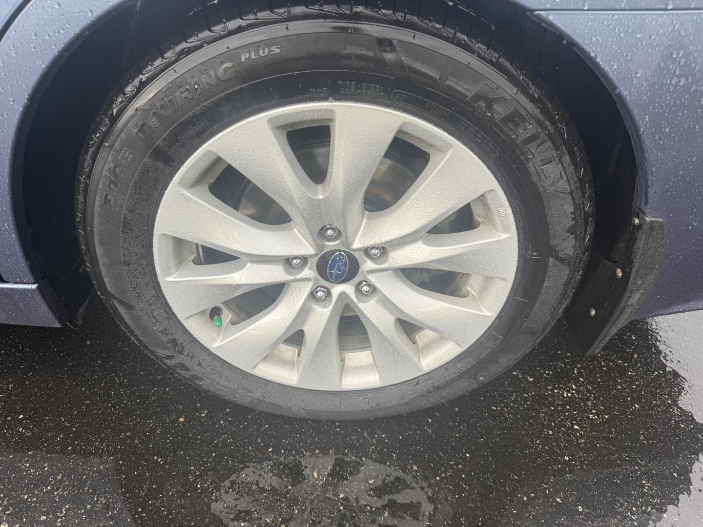 2015 Blue /Tan Subaru Legacy 2.5i Premium (4S3BNAC69F3) with an 2.5L H4 DOHC 16V engine, Automatic transmission, located at 11115 Chardon Rd. , Chardon, OH, 44024, (440) 214-9705, 41.580246, -81.241943 - This 2015 Subaru Legacy 2.5i Premium is equipped with a 2.5L H4 engine and Subaru's renowned Symmetrical All-Wheel Drive, delivering excellent traction and up to 35 MPG highway. This midsize sedan offers comfort and convenience with dual-zone automatic climate control, heated front seats, a power dr - Photo#11