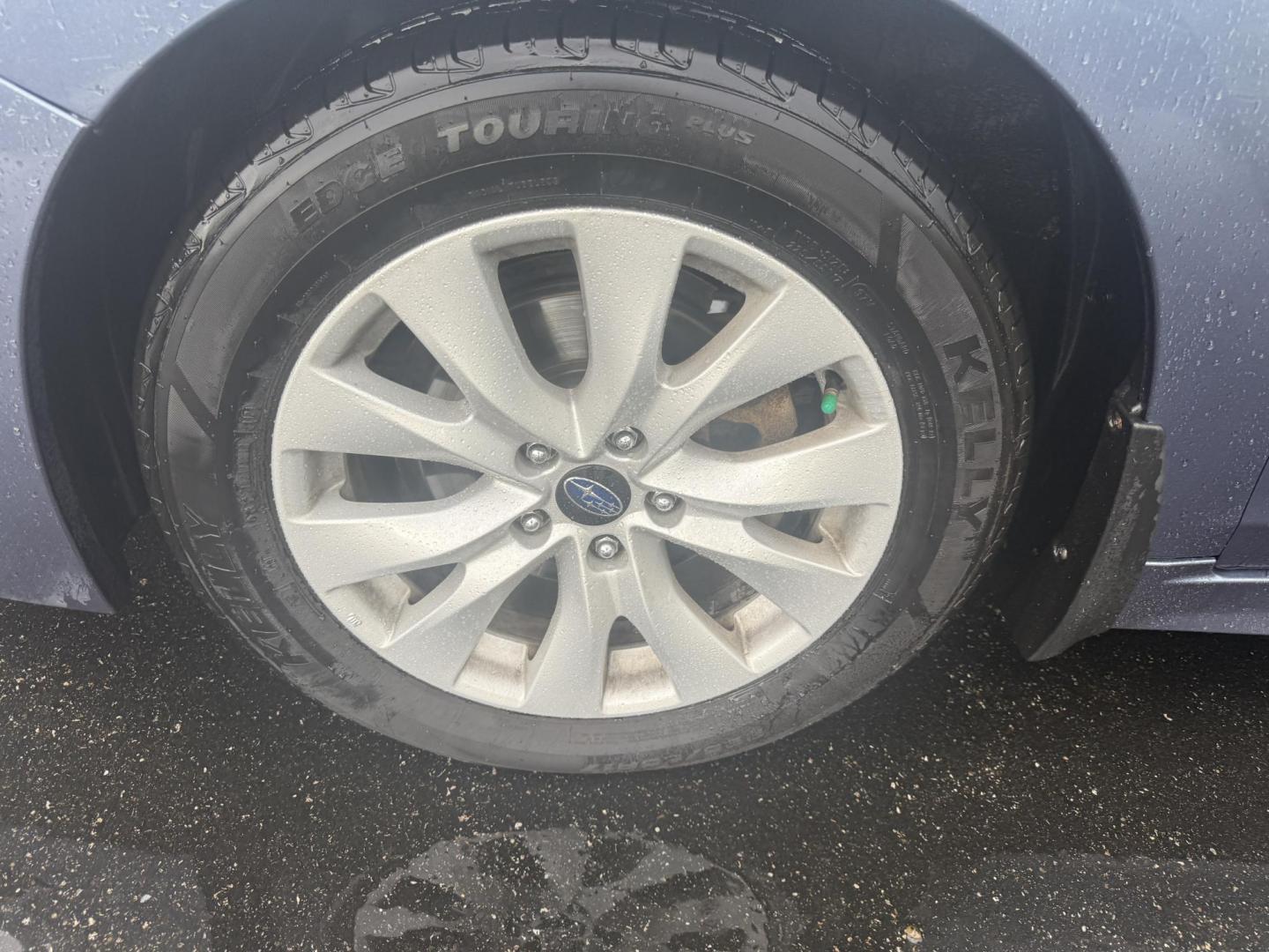 2015 Blue /Tan Subaru Legacy 2.5i Premium (4S3BNAC69F3) with an 2.5L H4 DOHC 16V engine, Automatic transmission, located at 11115 Chardon Rd. , Chardon, OH, 44024, (440) 214-9705, 41.580246, -81.241943 - This 2015 Subaru Legacy 2.5i Premium is equipped with a 2.5L H4 engine and Subaru's renowned Symmetrical All-Wheel Drive, delivering excellent traction and up to 35 MPG highway. This midsize sedan offers comfort and convenience with dual-zone automatic climate control, heated front seats, a power dr - Photo#13