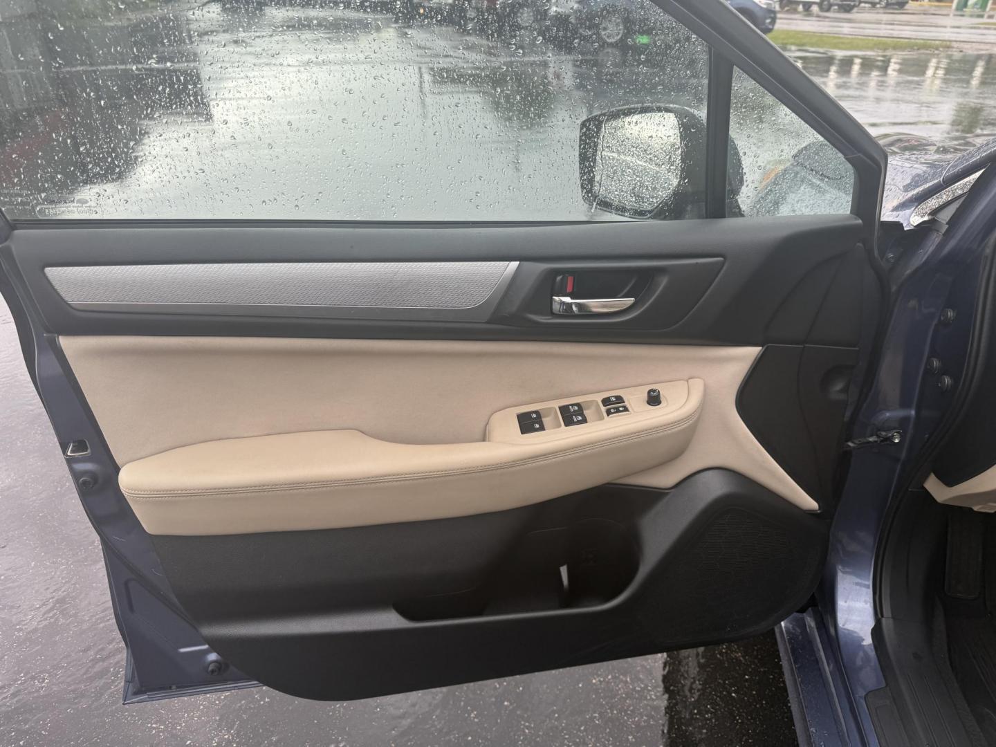 2015 Blue /Tan Subaru Legacy 2.5i Premium (4S3BNAC69F3) with an 2.5L H4 DOHC 16V engine, Automatic transmission, located at 11115 Chardon Rd. , Chardon, OH, 44024, (440) 214-9705, 41.580246, -81.241943 - This 2015 Subaru Legacy 2.5i Premium is equipped with a 2.5L H4 engine and Subaru's renowned Symmetrical All-Wheel Drive, delivering excellent traction and up to 35 MPG highway. This midsize sedan offers comfort and convenience with dual-zone automatic climate control, heated front seats, a power dr - Photo#16