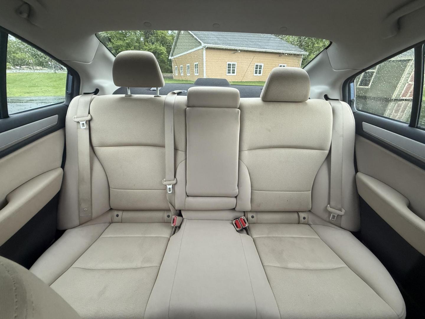2015 Blue /Tan Subaru Legacy 2.5i Premium (4S3BNAC69F3) with an 2.5L H4 DOHC 16V engine, Automatic transmission, located at 11115 Chardon Rd. , Chardon, OH, 44024, (440) 214-9705, 41.580246, -81.241943 - This 2015 Subaru Legacy 2.5i Premium is equipped with a 2.5L H4 engine and Subaru's renowned Symmetrical All-Wheel Drive, delivering excellent traction and up to 35 MPG highway. This midsize sedan offers comfort and convenience with dual-zone automatic climate control, heated front seats, a power dr - Photo#27