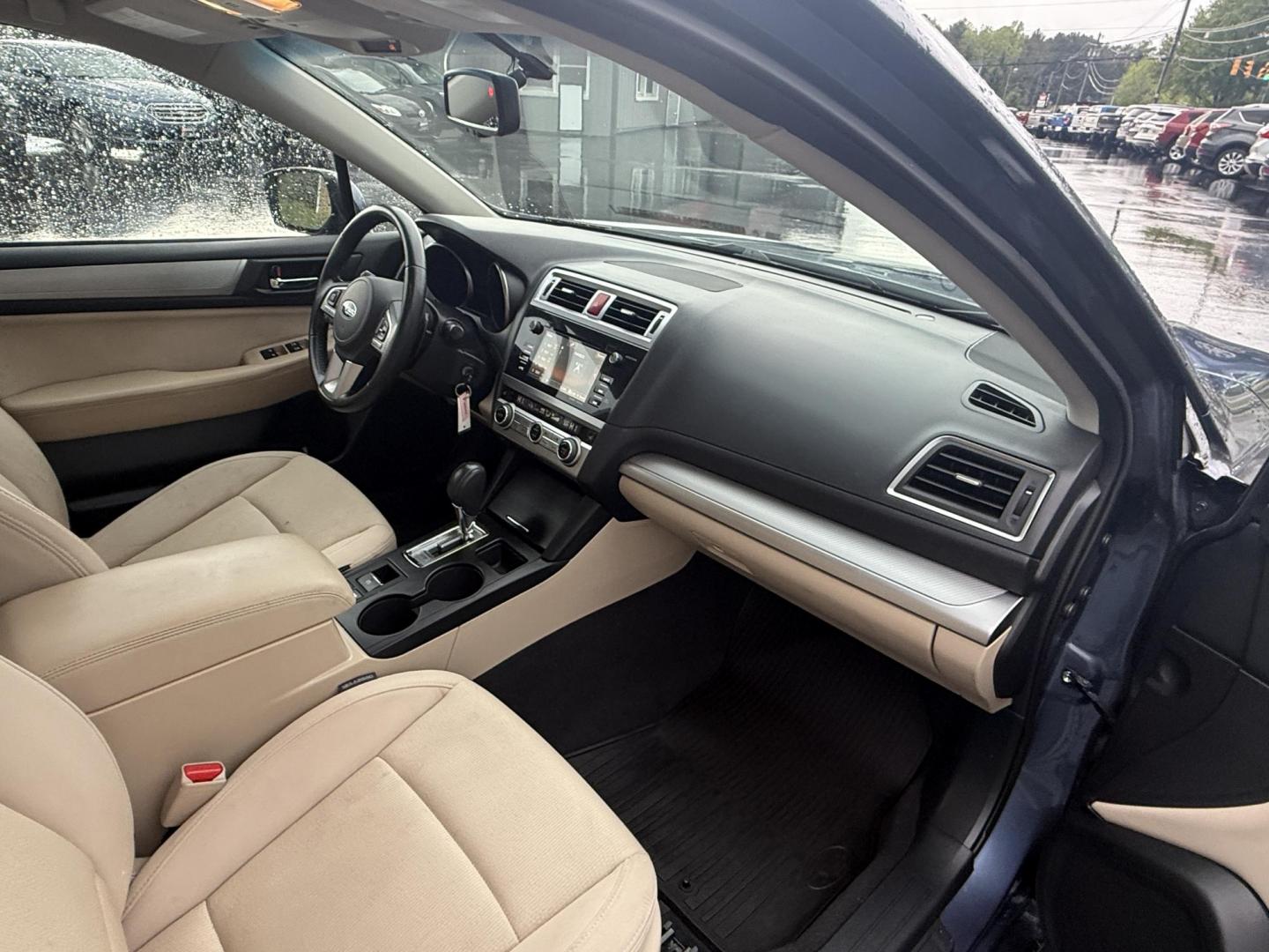 2015 Blue /Tan Subaru Legacy 2.5i Premium (4S3BNAC69F3) with an 2.5L H4 DOHC 16V engine, Automatic transmission, located at 11115 Chardon Rd. , Chardon, OH, 44024, (440) 214-9705, 41.580246, -81.241943 - This 2015 Subaru Legacy 2.5i Premium is equipped with a 2.5L H4 engine and Subaru's renowned Symmetrical All-Wheel Drive, delivering excellent traction and up to 35 MPG highway. This midsize sedan offers comfort and convenience with dual-zone automatic climate control, heated front seats, a power dr - Photo#36