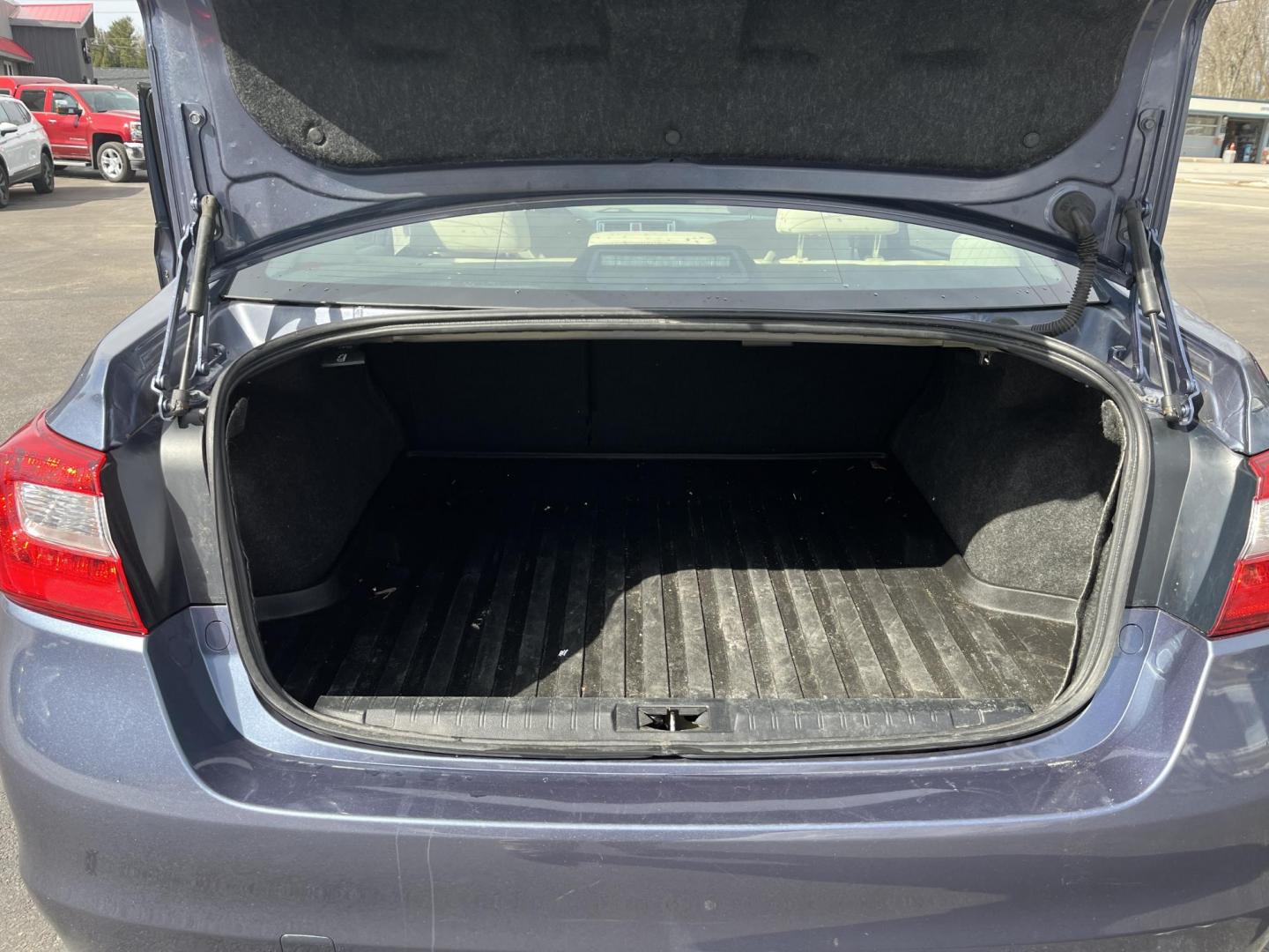 2015 Blue /Tan Subaru Legacy 2.5i Premium (4S3BNAC69F3) with an 2.5L H4 DOHC 16V engine, Automatic transmission, located at 11115 Chardon Rd. , Chardon, OH, 44024, (440) 214-9705, 41.580246, -81.241943 - 2015 Subaru Legacy 2.5i Premium PZEV – Reliable All-Weather Sedan with Excellent Efficiency and Premium Comfort! This 2015 Subaru Legacy 2.5i Premium PZEV is the perfect blend of Subaru’s legendary capability and everyday practicality! Powered by a smooth 2.5L H4 engine paired with the unbeatab - Photo#14