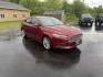 2016 Red /Black Ford Fusion SE AWD (3FA6P0T9XGR) with an 2.0L I4 DOHC 16V Turbo engine, 6A transmission, located at 11115 Chardon Rd. , Chardon, OH, 44024, (440) 214-9705, 41.580246, -81.241943 - This One Owner 2016 Ford Fusion SE AWD features a 2.0L turbocharged I4 engine paired with a 6-speed automatic transmission, offering a quick and fuel-efficient drive with up to 31 MPG highway. It boasts leather interior, heated power driver's seat, dual-zone automatic climate control, power moonroof - Photo#2