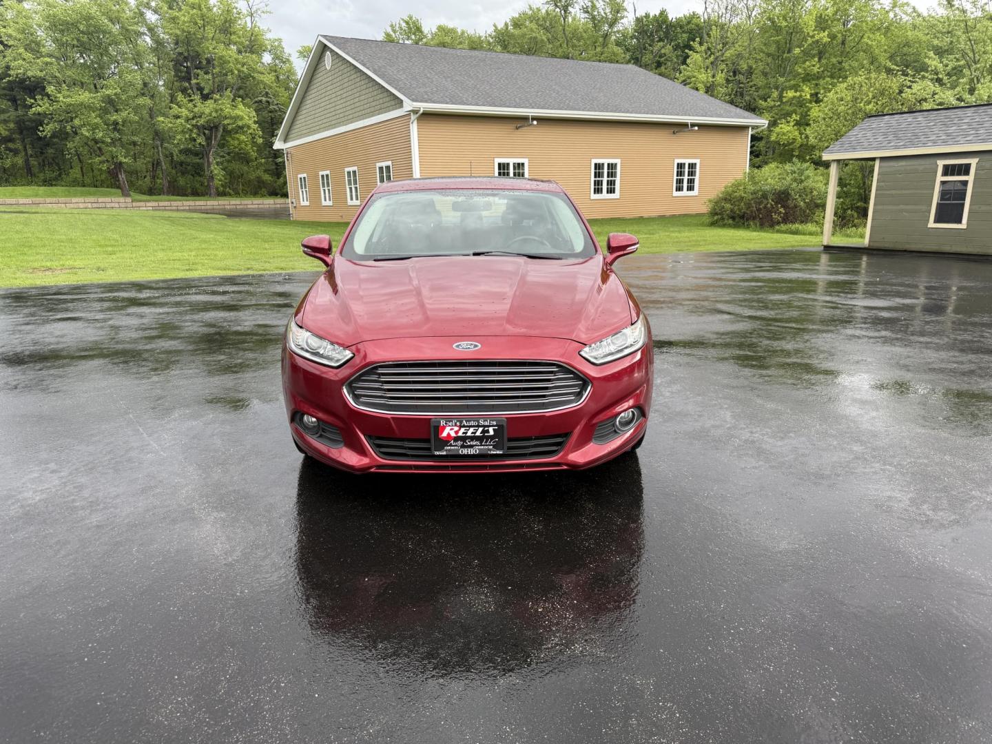 2016 Red /Black Ford Fusion SE AWD (3FA6P0T9XGR) with an 2.0L I4 DOHC 16V Turbo engine, 6A transmission, located at 11115 Chardon Rd. , Chardon, OH, 44024, (440) 214-9705, 41.580246, -81.241943 - This One Owner 2016 Ford Fusion SE AWD features a 2.0L turbocharged I4 engine paired with a 6-speed automatic transmission, offering a quick and fuel-efficient drive with up to 31 MPG highway. It boasts leather interior, heated power driver's seat, dual-zone automatic climate control, power moonroof - Photo#1