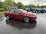 2016 Red /Black Ford Fusion SE AWD (3FA6P0T9XGR) with an 2.0L I4 DOHC 16V Turbo engine, 6A transmission, located at 11115 Chardon Rd. , Chardon, OH, 44024, (440) 214-9705, 41.580246, -81.241943 - This One Owner 2016 Ford Fusion SE AWD features a 2.0L turbocharged I4 engine paired with a 6-speed automatic transmission, offering a quick and fuel-efficient drive with up to 31 MPG highway. It boasts leather interior, heated power driver's seat, dual-zone automatic climate control, power moonroof - Photo#3