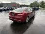 2016 Red /Black Ford Fusion SE AWD (3FA6P0T9XGR) with an 2.0L I4 DOHC 16V Turbo engine, 6A transmission, located at 11115 Chardon Rd. , Chardon, OH, 44024, (440) 214-9705, 41.580246, -81.241943 - This One Owner 2016 Ford Fusion SE AWD features a 2.0L turbocharged I4 engine paired with a 6-speed automatic transmission, offering a quick and fuel-efficient drive with up to 31 MPG highway. It boasts leather interior, heated power driver's seat, dual-zone automatic climate control, power moonroof - Photo#7