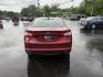 2016 Red /Black Ford Fusion SE AWD (3FA6P0T9XGR) with an 2.0L I4 DOHC 16V Turbo engine, 6A transmission, located at 11115 Chardon Rd. , Chardon, OH, 44024, (440) 214-9705, 41.580246, -81.241943 - This One Owner 2016 Ford Fusion SE AWD features a 2.0L turbocharged I4 engine paired with a 6-speed automatic transmission, offering a quick and fuel-efficient drive with up to 31 MPG highway. It boasts leather interior, heated power driver's seat, dual-zone automatic climate control, power moonroof - Photo#8