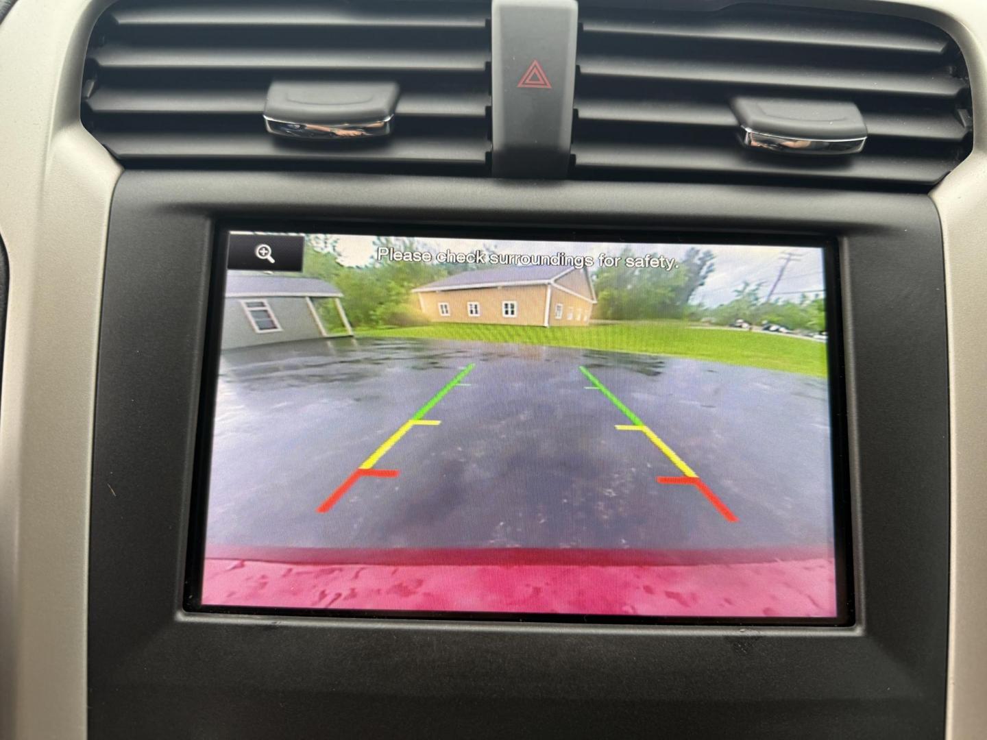 2016 Red /Black Ford Fusion SE AWD (3FA6P0T9XGR) with an 2.0L I4 DOHC 16V Turbo engine, 6A transmission, located at 11115 Chardon Rd. , Chardon, OH, 44024, (440) 214-9705, 41.580246, -81.241943 - This One Owner 2016 Ford Fusion SE AWD features a 2.0L turbocharged I4 engine paired with a 6-speed automatic transmission, offering a quick and fuel-efficient drive with up to 31 MPG highway. It boasts leather interior, heated power driver's seat, dual-zone automatic climate control, power moonroof - Photo#27