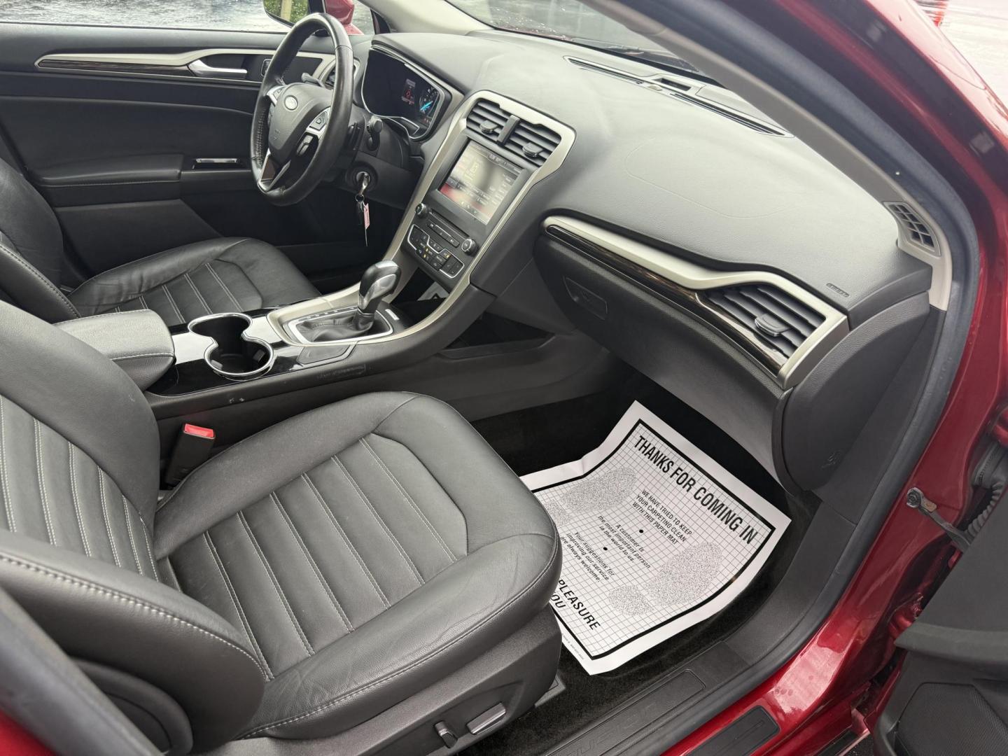 2016 Red /Black Ford Fusion SE AWD (3FA6P0T9XGR) with an 2.0L I4 DOHC 16V Turbo engine, 6A transmission, located at 11115 Chardon Rd. , Chardon, OH, 44024, (440) 214-9705, 41.580246, -81.241943 - This One Owner 2016 Ford Fusion SE AWD features a 2.0L turbocharged I4 engine paired with a 6-speed automatic transmission, offering a quick and fuel-efficient drive with up to 31 MPG highway. It boasts leather interior, heated power driver's seat, dual-zone automatic climate control, power moonroof - Photo#43