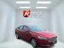 2016 Red /Black Ford Fusion SE AWD (3FA6P0T9XGR) with an 2.0L I4 DOHC 16V Turbo engine, 6A transmission, located at 11115 Chardon Rd. , Chardon, OH, 44024, (440) 214-9705, 41.580246, -81.241943 - This One Owner 2016 Ford Fusion SE AWD features a 2.0L turbocharged I4 engine paired with a 6-speed automatic transmission, offering a quick and fuel-efficient drive with up to 31 MPG highway. It boasts leather interior, heated power driver's seat, dual-zone automatic climate control, power moonroof - Photo#2