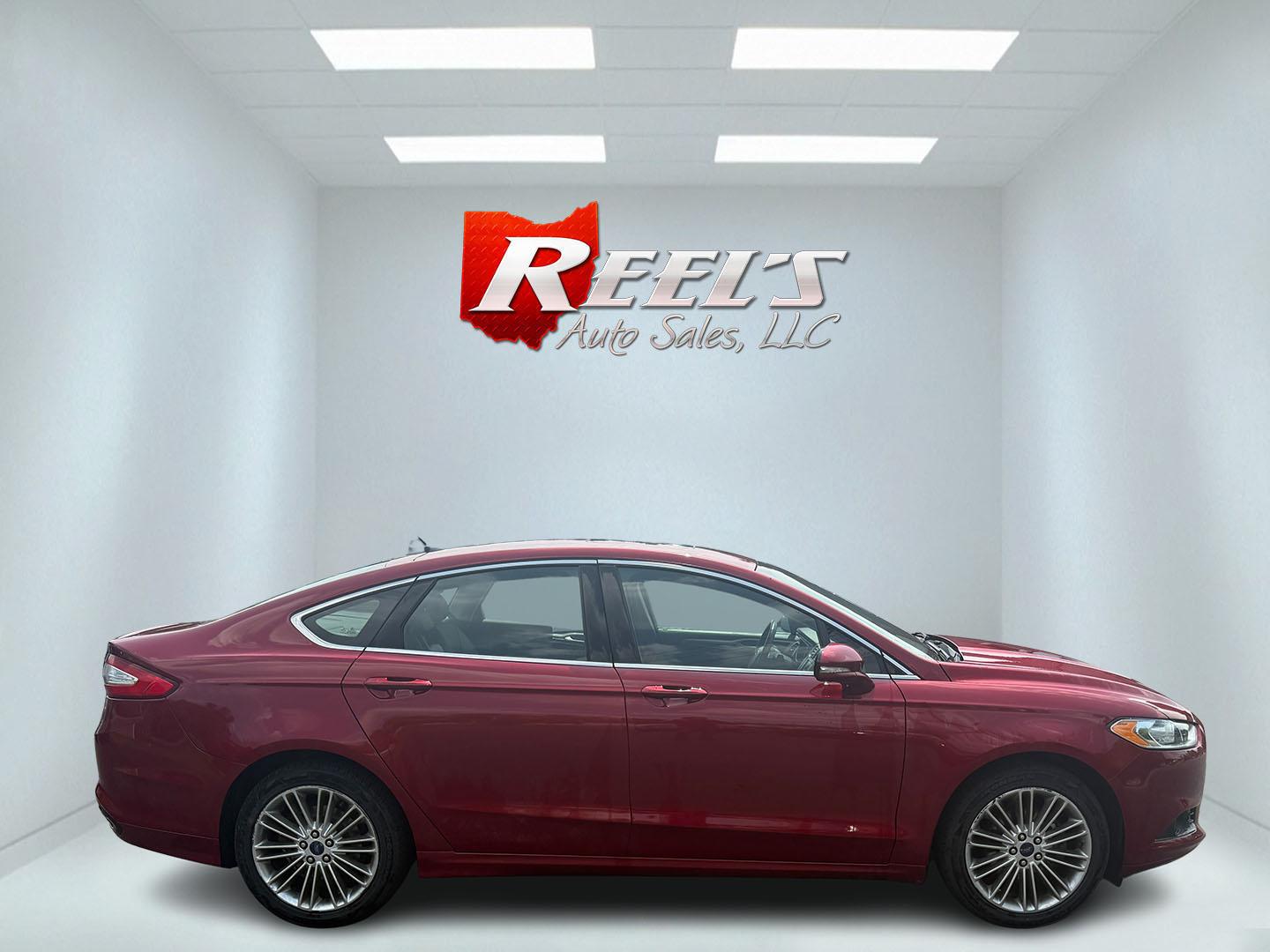 2016 Red /Black Ford Fusion SE AWD (3FA6P0T9XGR) with an 2.0L I4 DOHC 16V Turbo engine, 6A transmission, located at 11115 Chardon Rd. , Chardon, OH, 44024, (440) 214-9705, 41.580246, -81.241943 - This One Owner 2016 Ford Fusion SE AWD features a 2.0L turbocharged I4 engine paired with a 6-speed automatic transmission, offering a quick and fuel-efficient drive with up to 31 MPG highway. It boasts leather interior, heated power driver's seat, dual-zone automatic climate control, power moonroof - Photo#42