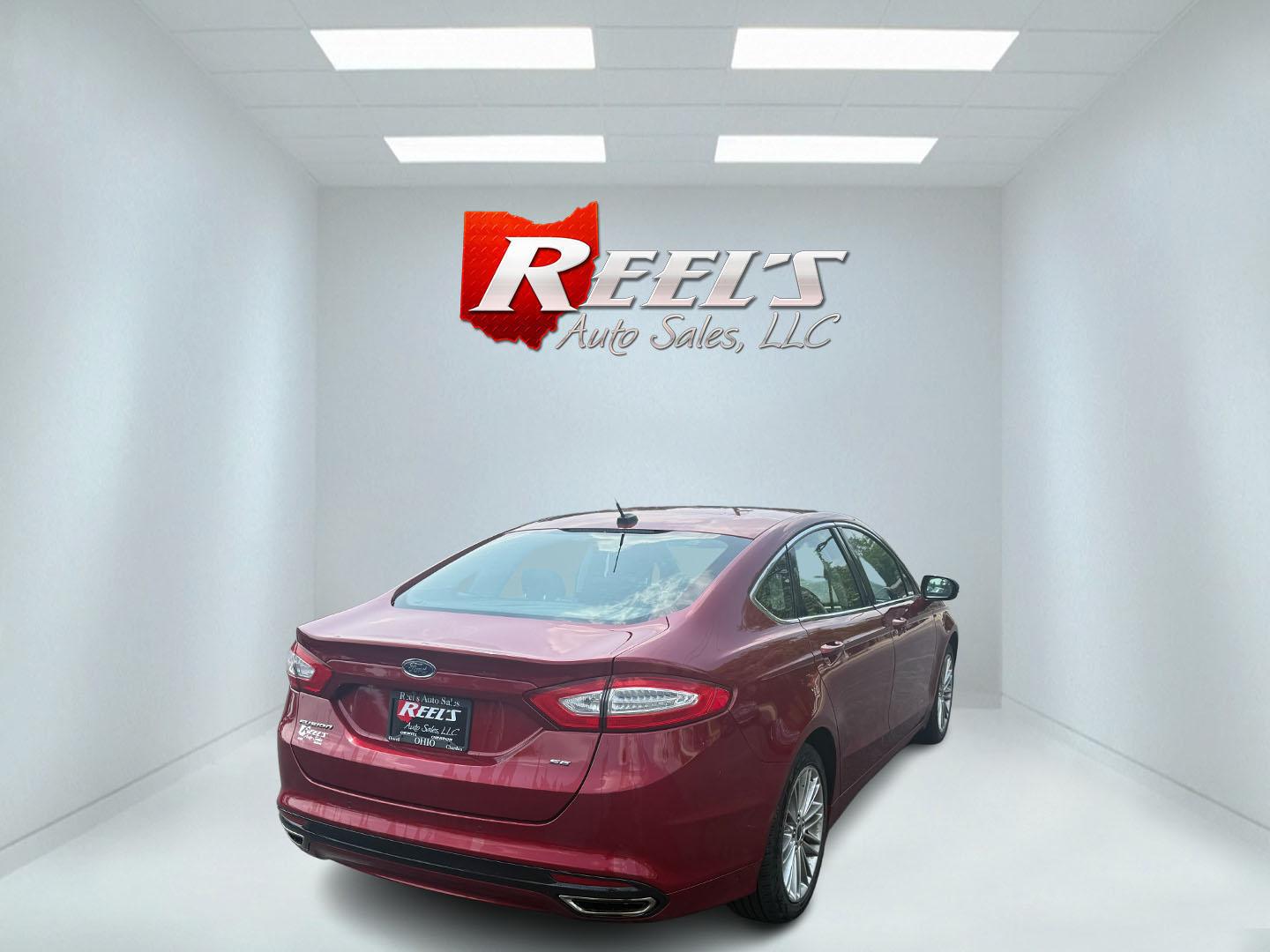 2016 Red /Black Ford Fusion SE AWD (3FA6P0T9XGR) with an 2.0L I4 DOHC 16V Turbo engine, 6A transmission, located at 11115 Chardon Rd. , Chardon, OH, 44024, (440) 214-9705, 41.580246, -81.241943 - This One Owner 2016 Ford Fusion SE AWD features a 2.0L turbocharged I4 engine paired with a 6-speed automatic transmission, offering a quick and fuel-efficient drive with up to 31 MPG highway. It boasts leather interior, heated power driver's seat, dual-zone automatic climate control, power moonroof - Photo#43