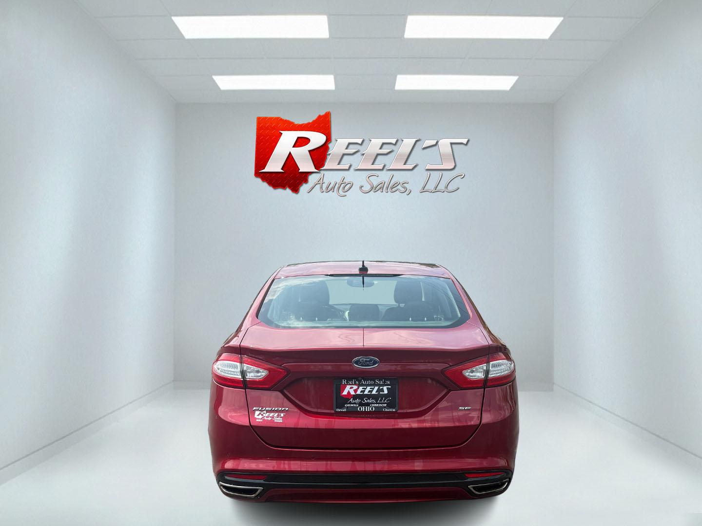 2016 Red /Black Ford Fusion SE AWD (3FA6P0T9XGR) with an 2.0L I4 DOHC 16V Turbo engine, 6A transmission, located at 11115 Chardon Rd. , Chardon, OH, 44024, (440) 214-9705, 41.580246, -81.241943 - This One Owner 2016 Ford Fusion SE AWD features a 2.0L turbocharged I4 engine paired with a 6-speed automatic transmission, offering a quick and fuel-efficient drive with up to 31 MPG highway. It boasts leather interior, heated power driver's seat, dual-zone automatic climate control, power moonroof - Photo#44