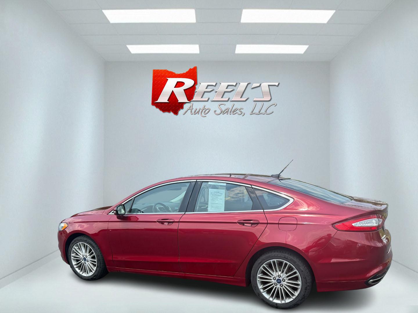 2016 Red /Black Ford Fusion SE AWD (3FA6P0T9XGR) with an 2.0L I4 DOHC 16V Turbo engine, 6A transmission, located at 11115 Chardon Rd. , Chardon, OH, 44024, (440) 214-9705, 41.580246, -81.241943 - This One Owner 2016 Ford Fusion SE AWD features a 2.0L turbocharged I4 engine paired with a 6-speed automatic transmission, offering a quick and fuel-efficient drive with up to 31 MPG highway. It boasts leather interior, heated power driver's seat, dual-zone automatic climate control, power moonroof - Photo#46