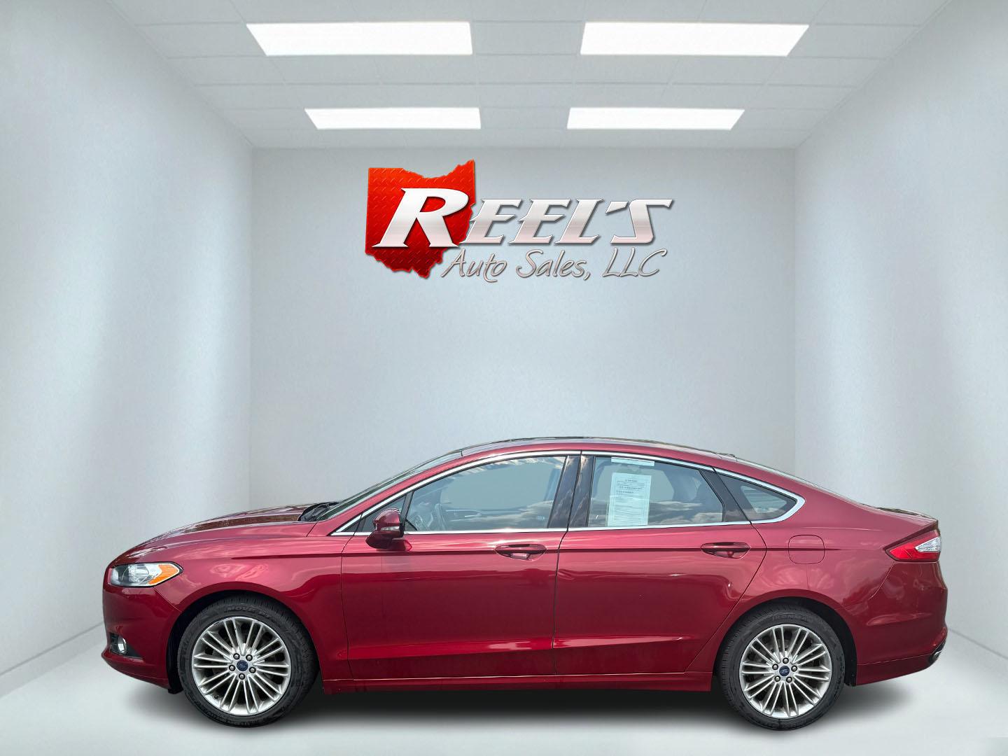 2016 Red /Black Ford Fusion SE AWD (3FA6P0T9XGR) with an 2.0L I4 DOHC 16V Turbo engine, 6A transmission, located at 11115 Chardon Rd. , Chardon, OH, 44024, (440) 214-9705, 41.580246, -81.241943 - This One Owner 2016 Ford Fusion SE AWD features a 2.0L turbocharged I4 engine paired with a 6-speed automatic transmission, offering a quick and fuel-efficient drive with up to 31 MPG highway. It boasts leather interior, heated power driver's seat, dual-zone automatic climate control, power moonroof - Photo#47