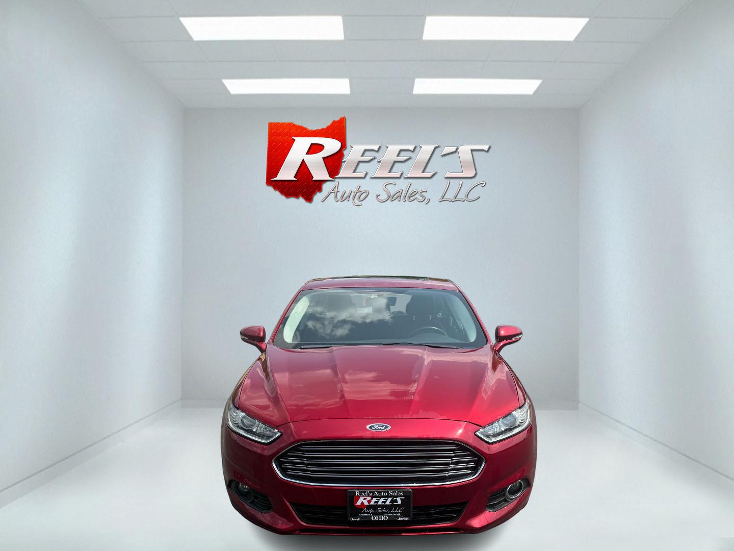 2016 Red /Black Ford Fusion SE AWD (3FA6P0T9XGR) with an 2.0L I4 DOHC 16V Turbo engine, 6A transmission, located at 11115 Chardon Rd. , Chardon, OH, 44024, (440) 214-9705, 41.580246, -81.241943 - This One Owner 2016 Ford Fusion SE AWD features a 2.0L turbocharged I4 engine paired with a 6-speed automatic transmission, offering a quick and fuel-efficient drive with up to 31 MPG highway. It boasts leather interior, heated power driver's seat, dual-zone automatic climate control, power moonroof - Photo#1