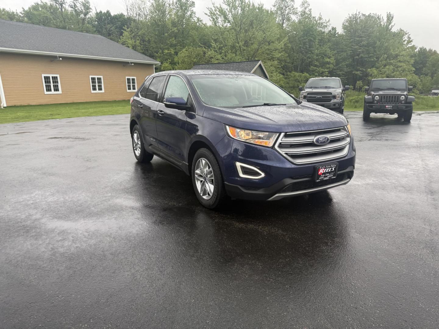 2016 Blue /Tan Ford Edge SEL AWD (2FMPK4J83GB) with an 3.5L V6 DOHC 24V engine, 6A transmission, located at 11115 Chardon Rd. , Chardon, OH, 44024, (440) 214-9705, 41.580246, -81.241943 - Photo#2