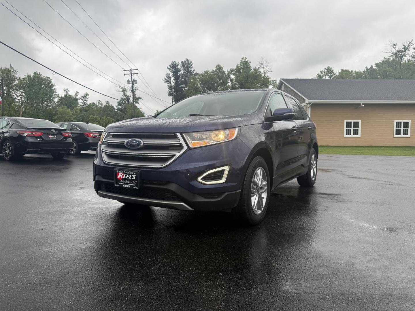 2016 Blue /Tan Ford Edge SEL AWD (2FMPK4J83GB) with an 3.5L V6 DOHC 24V engine, 6A transmission, located at 11115 Chardon Rd. , Chardon, OH, 44024, (440) 214-9705, 41.580246, -81.241943 - Photo#0