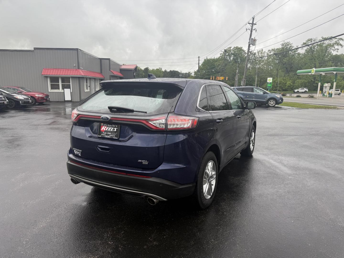 2016 Blue /Tan Ford Edge SEL AWD (2FMPK4J83GB) with an 3.5L V6 DOHC 24V engine, 6A transmission, located at 11115 Chardon Rd. , Chardon, OH, 44024, (440) 214-9705, 41.580246, -81.241943 - Photo#7