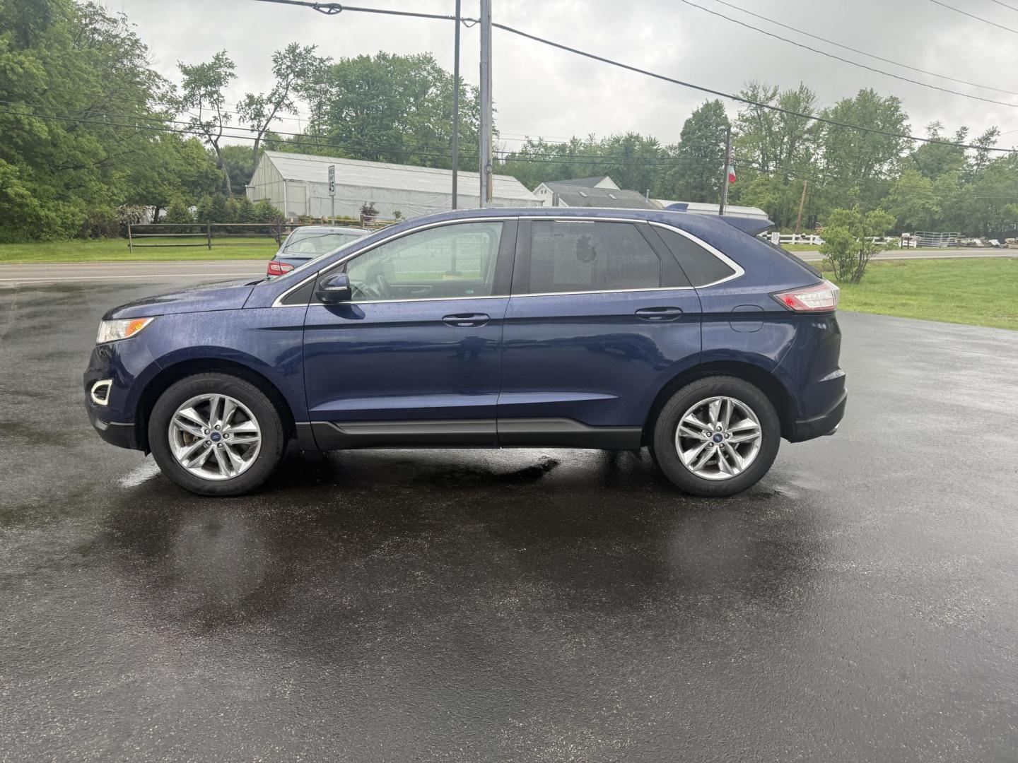 2016 Blue /Tan Ford Edge SEL AWD (2FMPK4J83GB) with an 3.5L V6 DOHC 24V engine, 6A transmission, located at 11115 Chardon Rd. , Chardon, OH, 44024, (440) 214-9705, 41.580246, -81.241943 - Photo#12