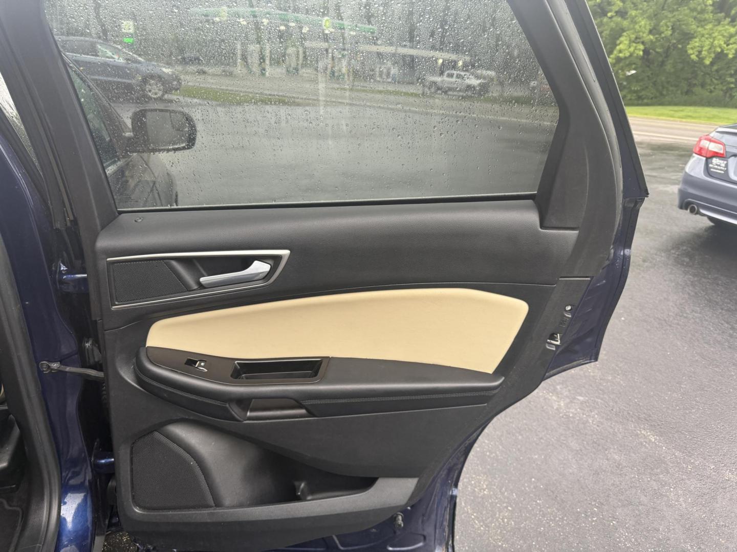 2016 Blue /Tan Ford Edge SEL AWD (2FMPK4J83GB) with an 3.5L V6 DOHC 24V engine, 6A transmission, located at 11115 Chardon Rd. , Chardon, OH, 44024, (440) 214-9705, 41.580246, -81.241943 - Photo#36