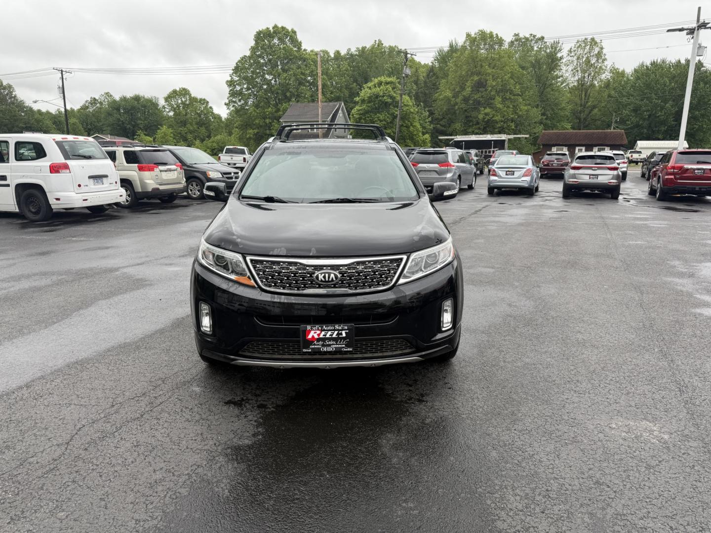 2014 Black /Black Kia Sorento SX V6 AWD (5XYKWDA78EG) with an 3.3L V6 DOHC 24V engine, 6-Speed Automatic transmission, located at 547 E. Main St., Orwell, OH, 44076, (440) 437-5893, 41.535435, -80.847855 - This 2014 Kia Sorento is a fully loaded family hauler. Equipped with Kia's 3.3 GDI V6 and a tried and true 6 speed automatic transmission it can haul 7 people and tow up to 3,500 pounds. On the inside you will find a luxurious leather interior, heated and cooled front seats, a 10 speaker Infinity su - Photo#1