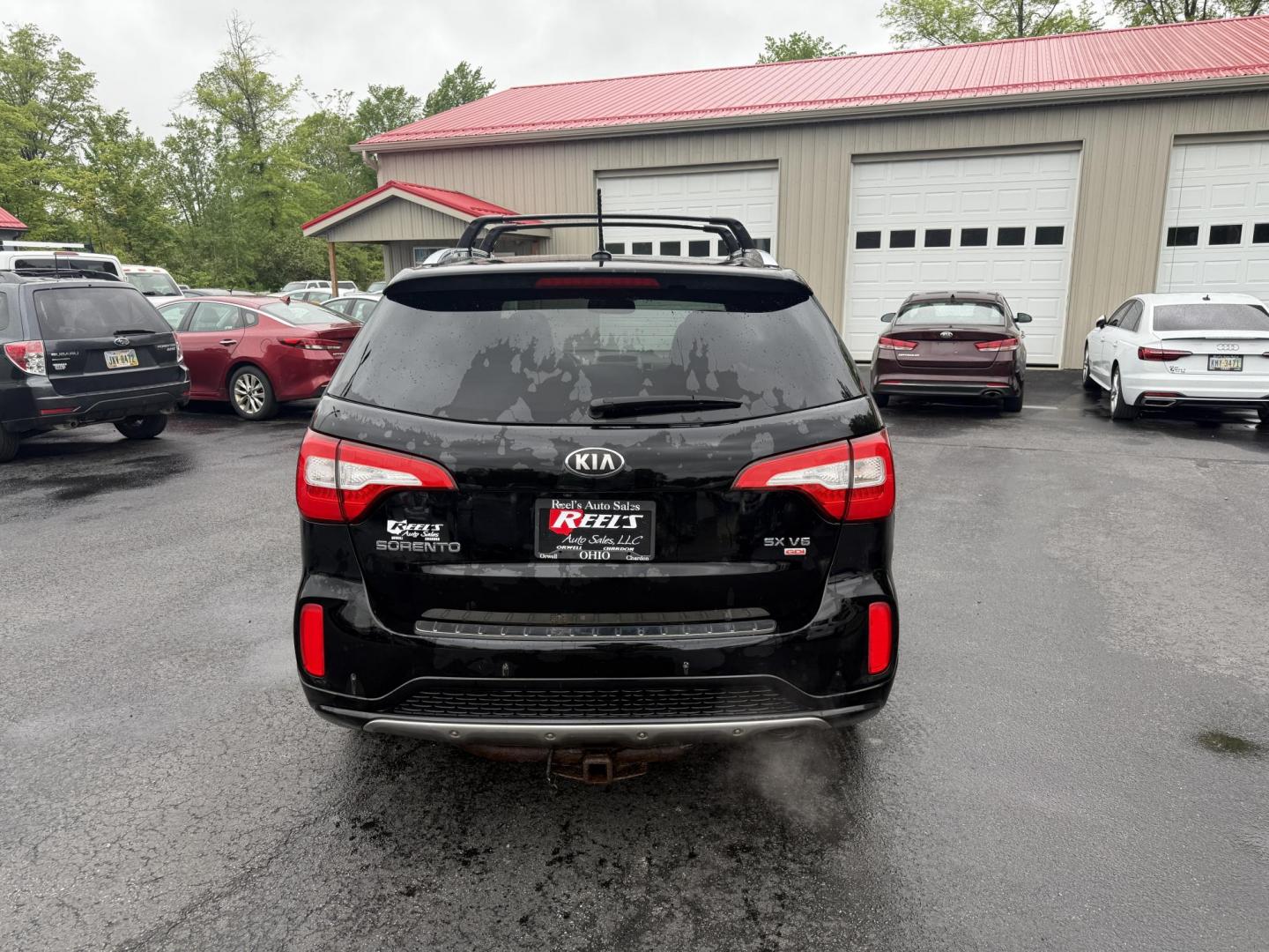 2014 Black /Black Kia Sorento SX V6 AWD (5XYKWDA78EG) with an 3.3L V6 DOHC 24V engine, 6-Speed Automatic transmission, located at 547 E. Main St., Orwell, OH, 44076, (440) 437-5893, 41.535435, -80.847855 - This 2014 Kia Sorento is a fully loaded family hauler. Equipped with Kia's 3.3 GDI V6 and a tried and true 6 speed automatic transmission it can haul 7 people and tow up to 3,500 pounds. On the inside you will find a luxurious leather interior, heated and cooled front seats, a 10 speaker Infinity su - Photo#9