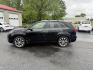 2014 Black /Black Kia Sorento SX V6 AWD (5XYKWDA78EG) with an 3.3L V6 DOHC 24V engine, 6-Speed Automatic transmission, located at 547 E. Main St., Orwell, OH, 44076, (440) 437-5893, 41.535435, -80.847855 - This 2014 Kia Sorento is a fully loaded family hauler. Equipped with Kia's 3.3 GDI V6 and a tried and true 6 speed automatic transmission it can haul 7 people and tow up to 3,500 pounds. On the inside you will find a luxurious leather interior, heated and cooled front seats, a 10 speaker Infinity su - Photo#13