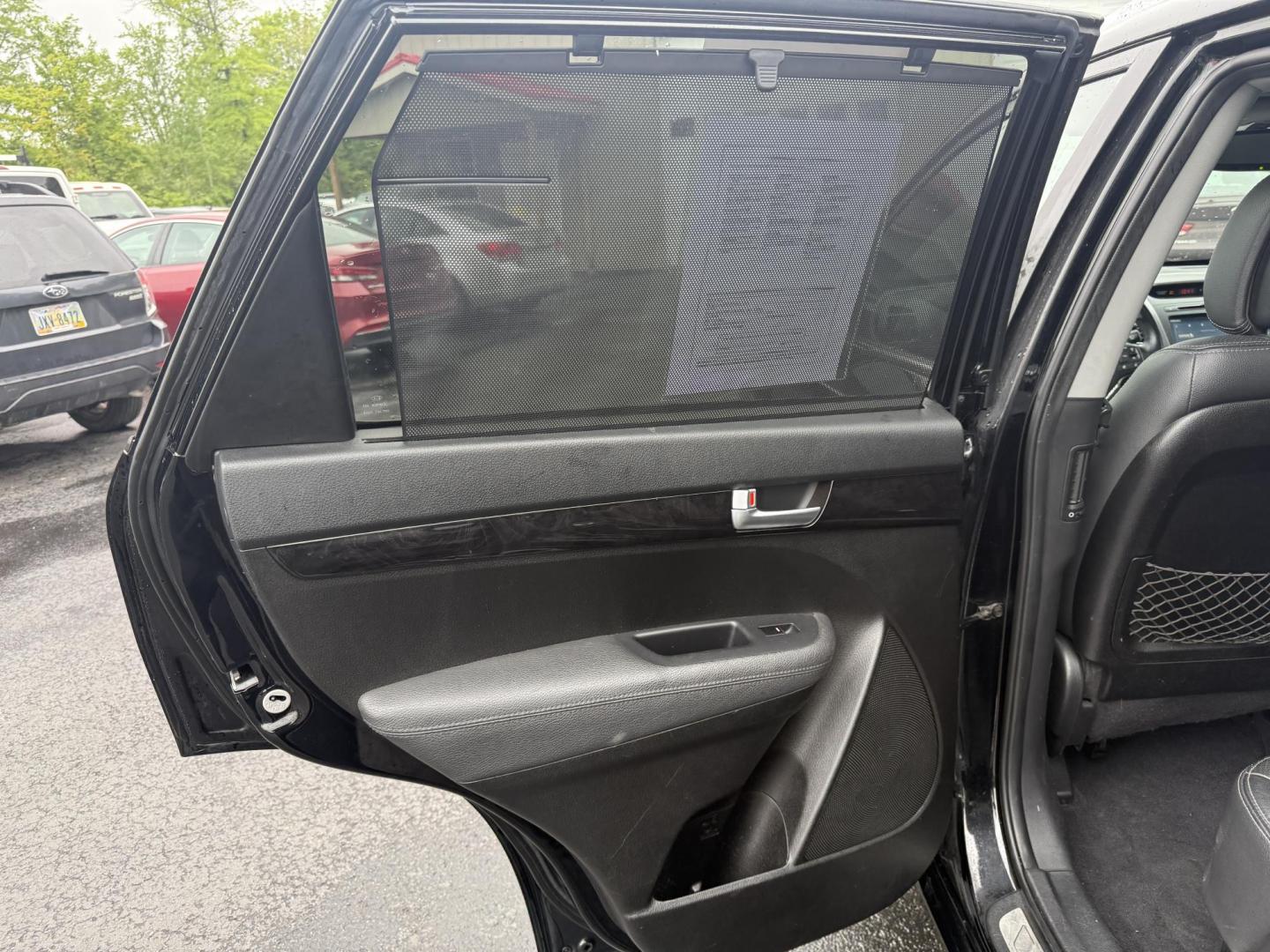 2014 Black /Black Kia Sorento SX V6 AWD (5XYKWDA78EG) with an 3.3L V6 DOHC 24V engine, 6-Speed Automatic transmission, located at 547 E. Main St., Orwell, OH, 44076, (440) 437-5893, 41.535435, -80.847855 - This 2014 Kia Sorento is a fully loaded family hauler. Equipped with Kia's 3.3 GDI V6 and a tried and true 6 speed automatic transmission it can haul 7 people and tow up to 3,500 pounds. On the inside you will find a luxurious leather interior, heated and cooled front seats, a 10 speaker Infinity su - Photo#35